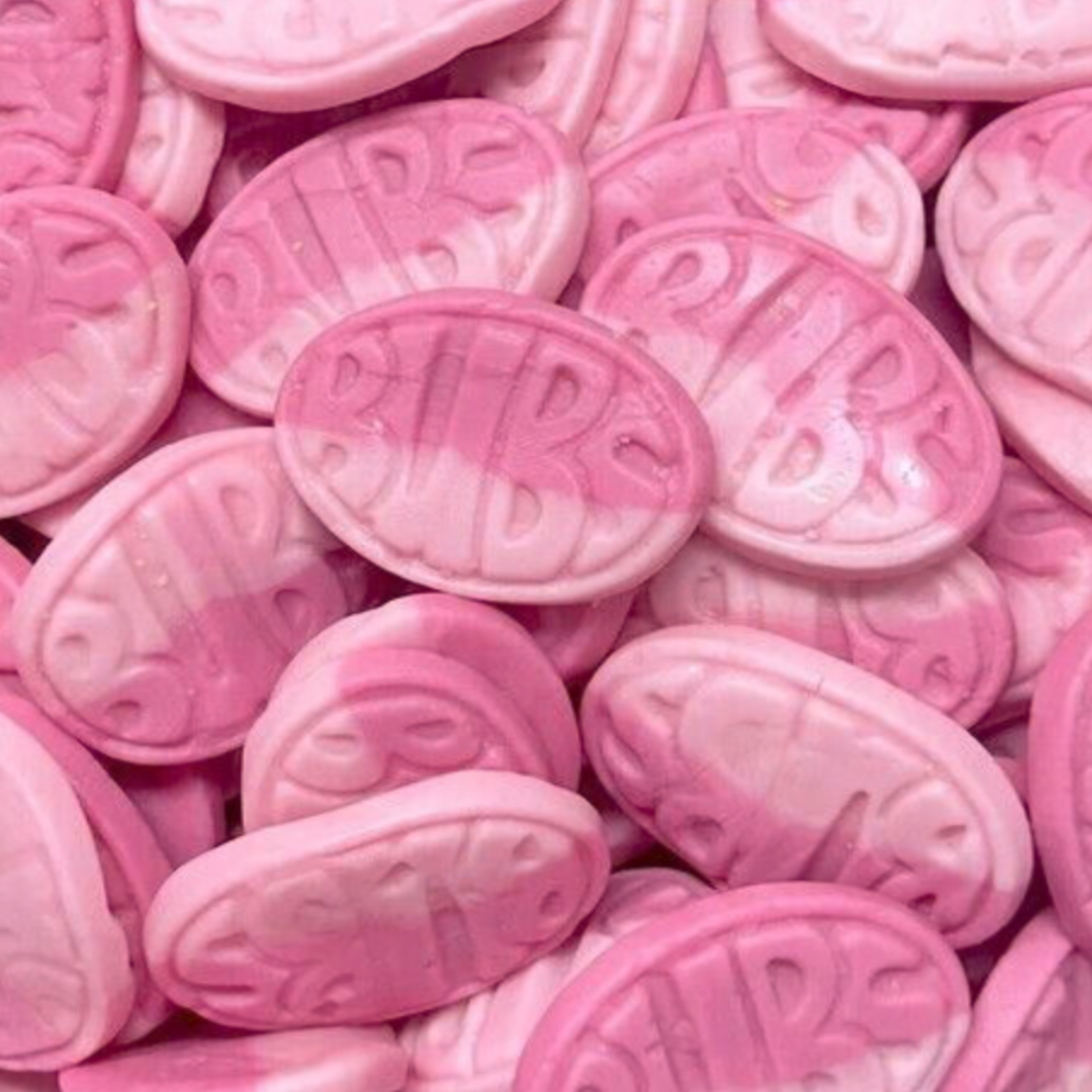 Close-up of pink oval candies with 'Bubs' branding.