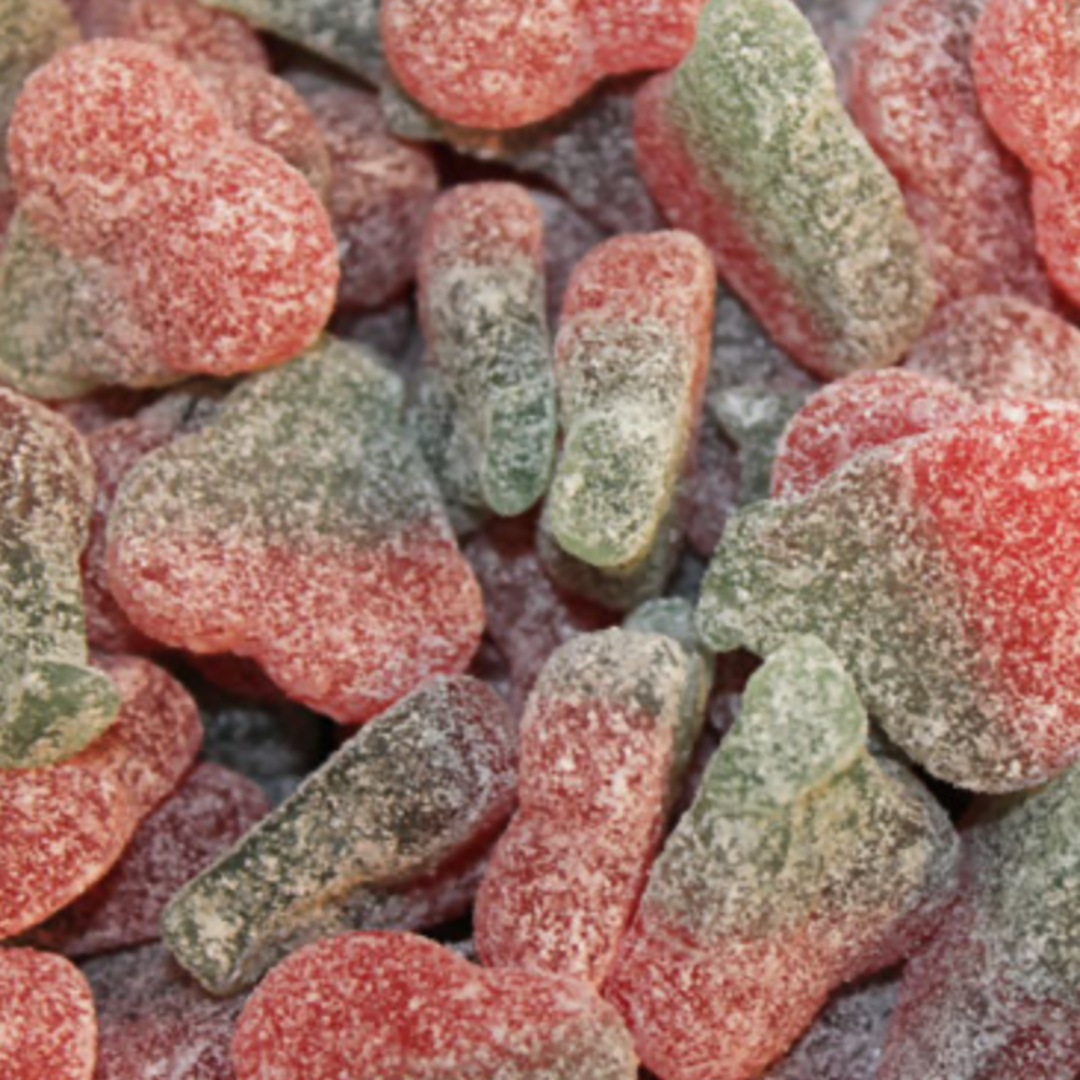 Close-up of colorful gummy cherry shaped. Green and red with white sugar coated.