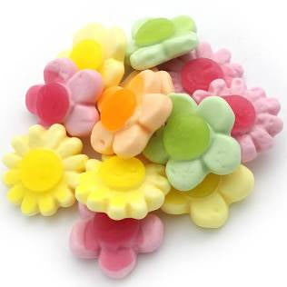 Colorful flower-shaped candy on a white background