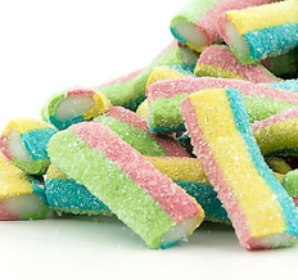 Colorful rainbow candy sticks on a white background.
