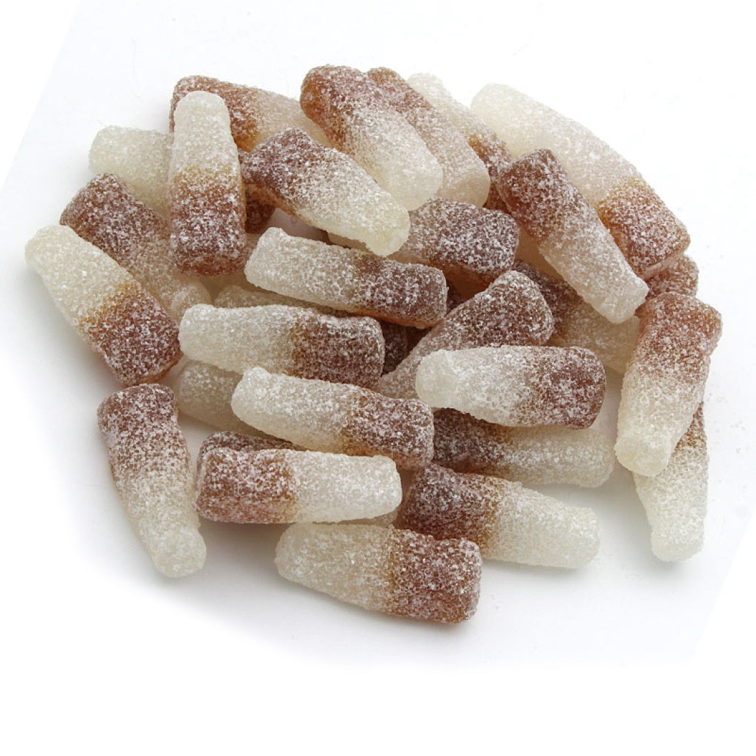 Gummy candies with brown and white coloration shaped as bottles on a white background
