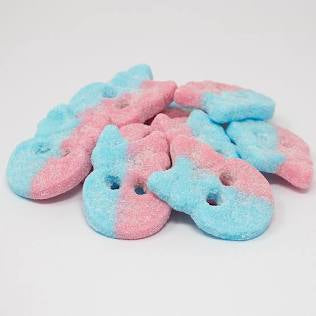 Pink and blue skull-shaped cookies on a white background