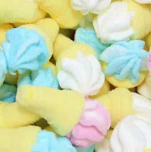 Close-up of colorful marshmallow candy blue, yellow, and pink. 