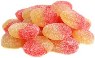 Assorted colorful candy blue and yellow peach look and taste like sweet peaches on a white background