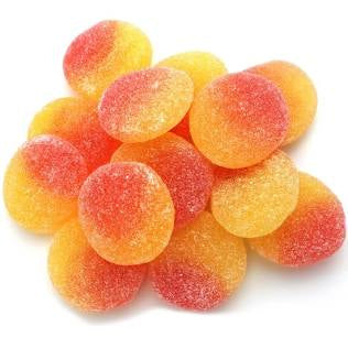 Red yellow candy coated with sugar. Peach color and taste like sweet peaches.