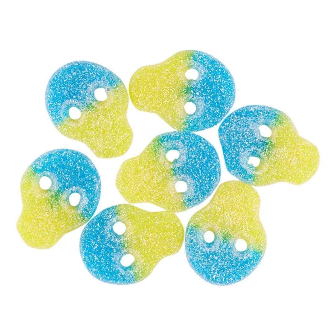 Gummy skull candies with blue and yellow gradient on a white background.