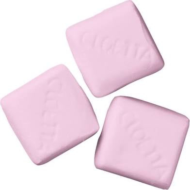 Three pink marshmallows objects on a white background