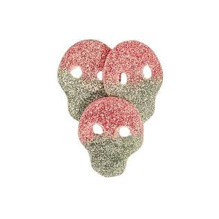 Two sugar coated skull shaped objects on a white background.